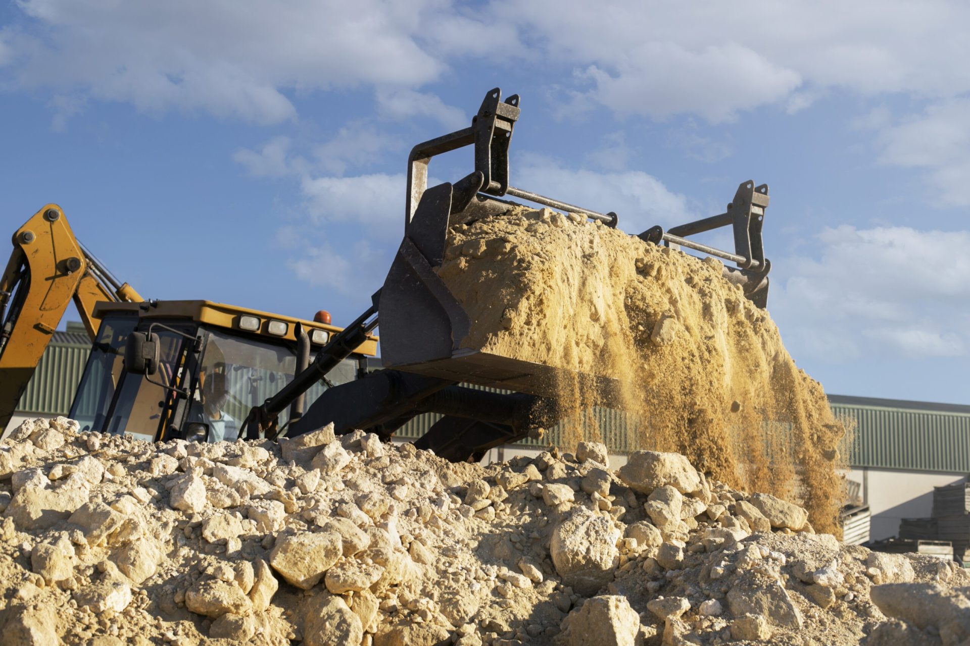 Image by <a href="https://www.freepik.com/free-photo/heavy-excavator-digging-day-light_20828290.htm#query=building%20demolition&position=1&from_view=search&track=ais&uuid=4cf08832-e74c-49c4-a6d3-5957c459859d">Freepik</a>